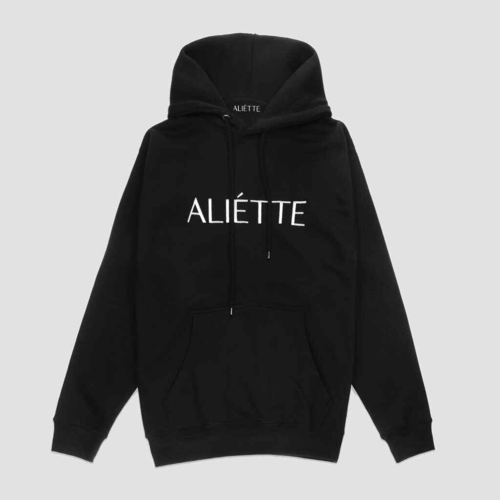 Female black flat lying hoodies