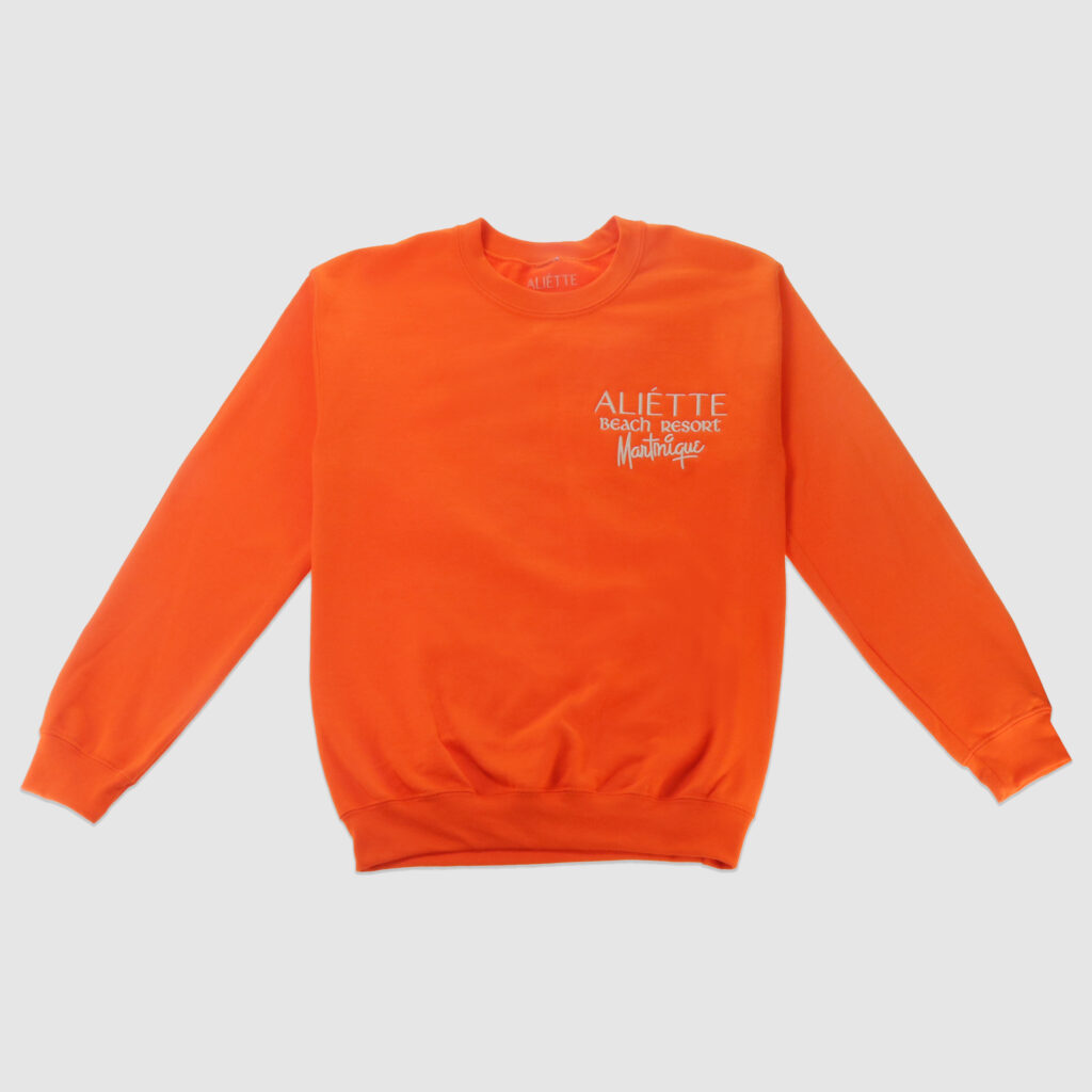 Orange flat lying sweaters